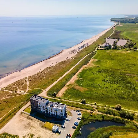 Beachwavethree- 2og, Barrierearm, Meerblick, Balkon, Kamin, Sauna Apartment Olpenitz