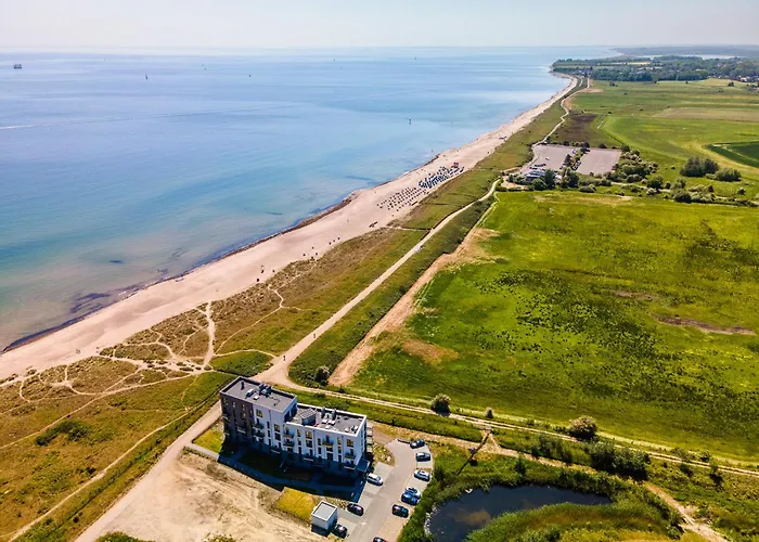 Beachwavethree- 2og, Barrierearm, Meerblick, Balkon, Kamin, Sauna Appartement Olpenitz