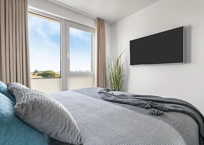 Appartement Beachwavethree- 2og, Barrierearm, Meerblick, Balkon, Kamin, Sauna Olpenitz